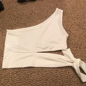 White size xs one shoulder top. Never worn.